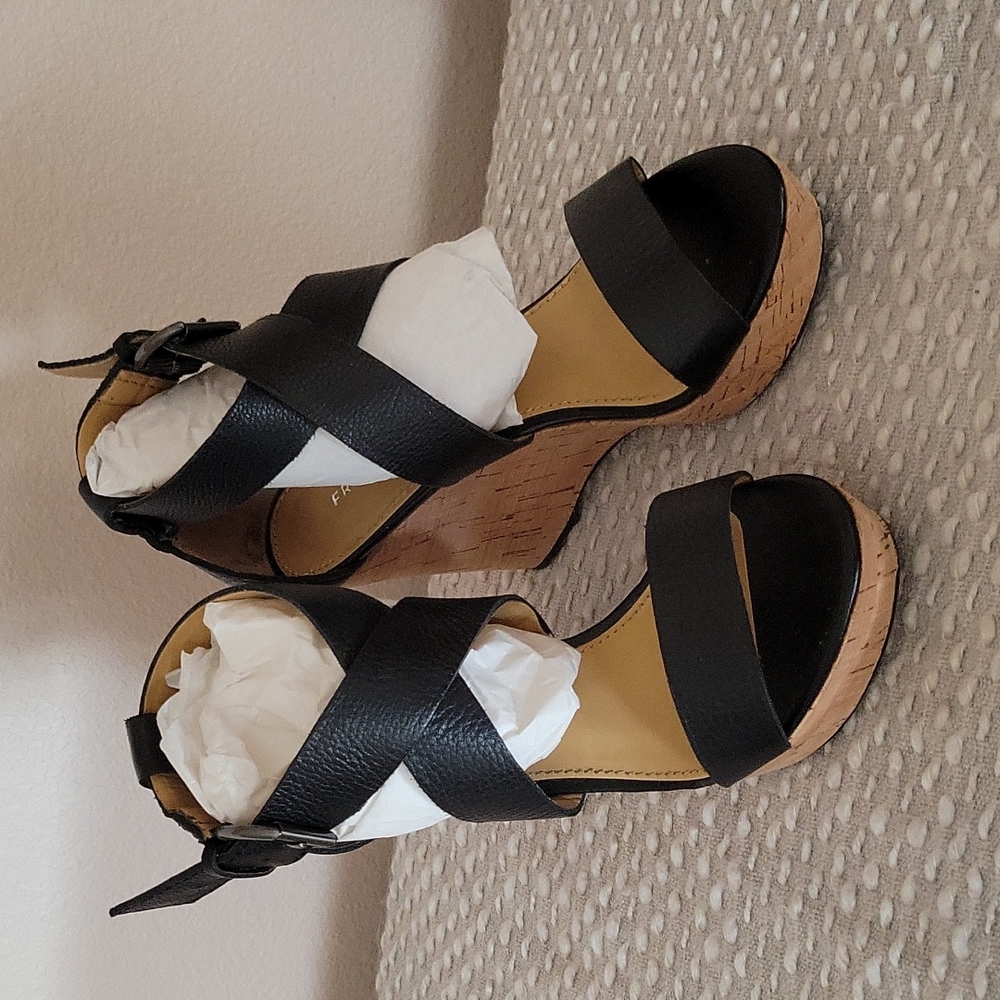 Gently used wedge sandals in black